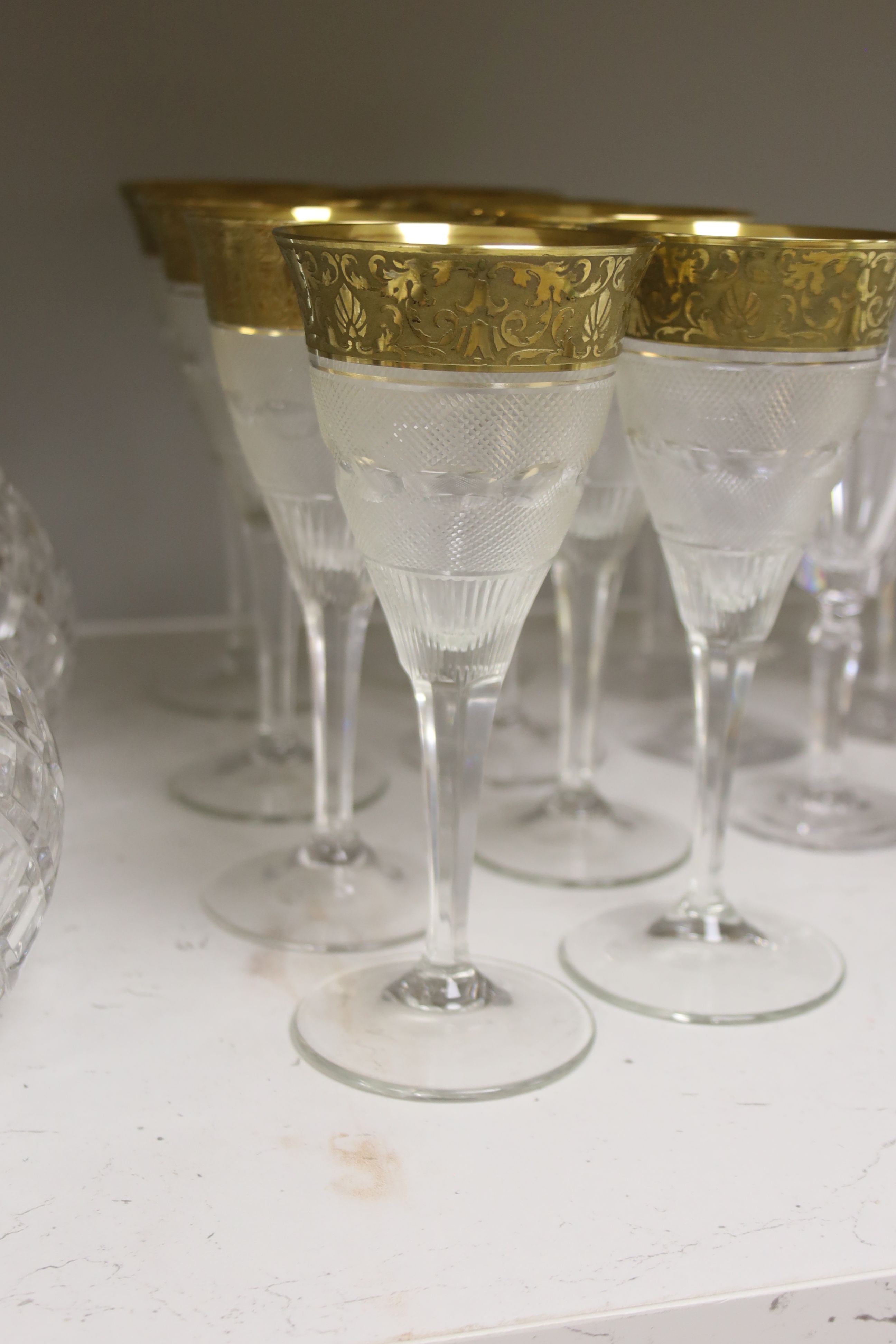 A pair of cut glass silver-mounted decanters and a quantity of cut crystal table glassware